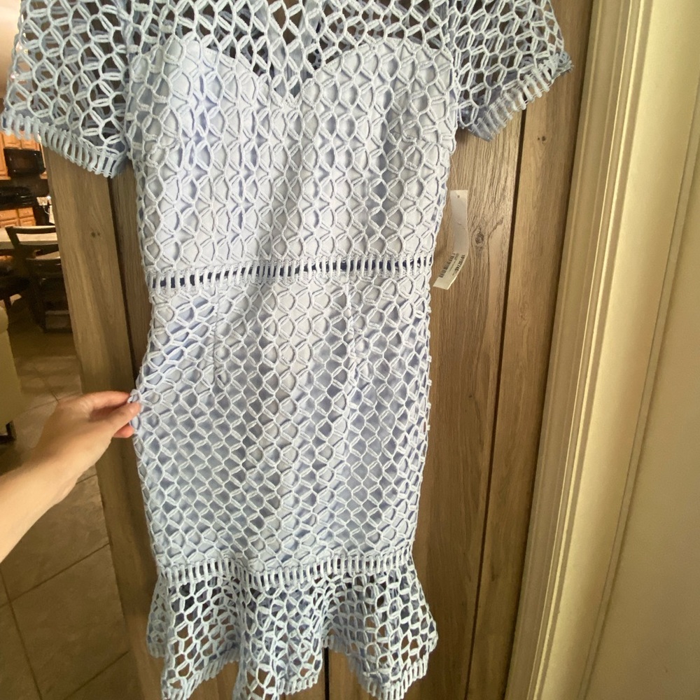 Aqua fishnet dusty blue dress in a size small new with tags.